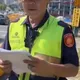 影/總統車隊經過不能錄影？警民爆衝突　警方：柔性勸導