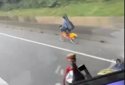 爭路權？男子背吉他騎YouBike攻國道　三寶騎車法警方說有這後果