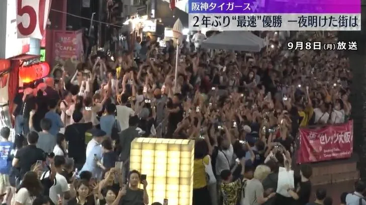 影/阪神虎睽違2年奪冠！球迷塞爆道頓堀　29人「跳河慶祝」