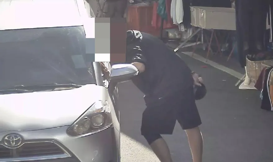 影/台中醉漢街頭揮平底鍋嚇壞市場民眾　警冷靜破局獲讚